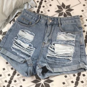 ripped demin shorts